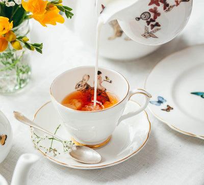 Why does tea taste better from a bone china cup?